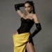 Anitta exibe look amarelo e preto para festa de aniversário de 30 anos