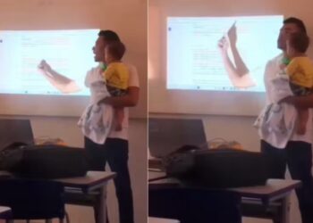 Professor segura bebê de aluna no colo para ela acompanhar aula; Assista